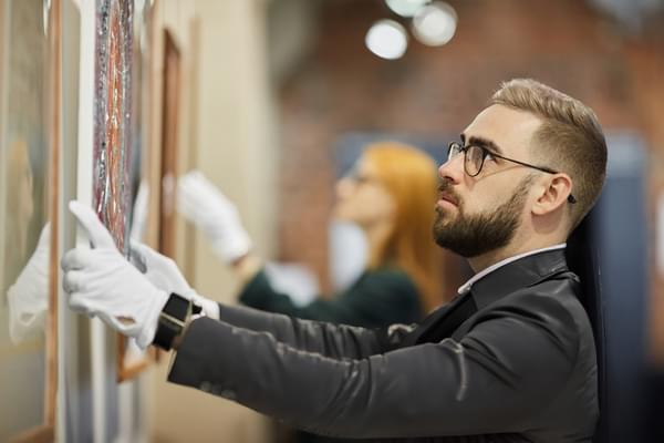 Enforcement agent removing valuable artwork while enforcing a bill of sale